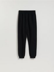 Spodnie dresowe long leg - czarny. Czarne spodnie dresowe damskie Reserved, l, bez wzorów, z bawełny. Za 79.99 zł.