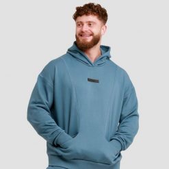 Bluza męska fitness z kapturem niebieska Unity. Niebieskie bluzy męskie GYMBEAM, l, bez wzorów, z bawełny, z kapturem. Za 122.90 zł.