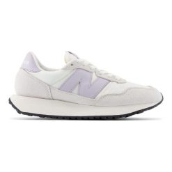 Buty do chodzenia damskie New Balance 237. Białe obuwie sportowe damskie New Balance, z aplikacjami, z jeansu, trekkingowe. Za 458.60 zł.