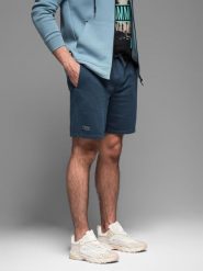 Krótkie spodenki dresowe męskie RELAXED FIT w stylu athleisure granatowe V4 OM-SRWS-0122 S. Krótkie spodenki sportowe męskie Ombre, m, bez wzorów, z dresówki. Za 121.01 zł.
