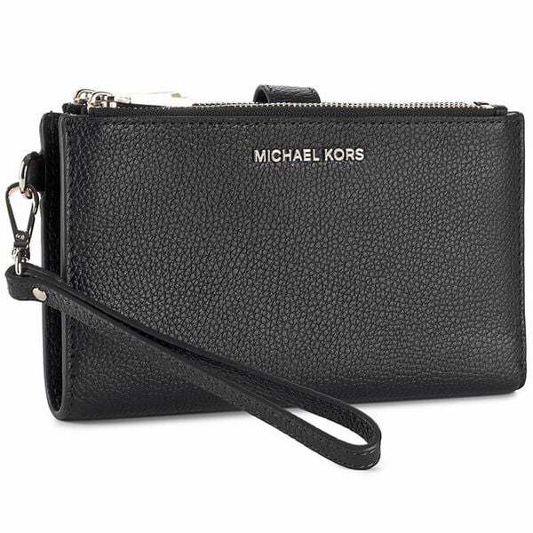 Portfel MICHAEL Michael Kors. Czarne portfele damskie MICHAEL Michael Kors, bez wzorów. Za 539.99 zł.