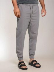 Spodnie jogger - szary. Szare spodnie materiałowe męskie Sinsay, m, bez wzorów. Za 49.99 zł.