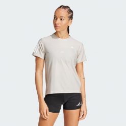 Koszulka Own The Run. Brązowe t-shirty damskie Adidas, xs, bez wzorów, z materiału, sportowe, bez kołnierzyka. Za 159.00 zł.