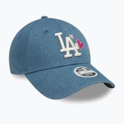 Czapka z daszkiem damska New Era Denim Icon 9Forty Los Angeles Dodgers. Niebieskie czapki i kapelusze damskie New Era, na zimę, bez wzorów, z denimu. Za 129.99 zł.