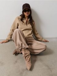 Spodnie wide leg z wiskozą i wiązaniem w pasie i przy nogawkach - beżowy. Brązowe spodnie materiałowe damskie Sinsay, l, bez wzorów, z wiskozy. Za 49.99 zł.