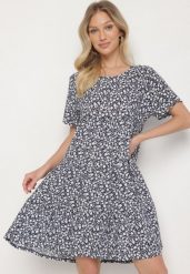 Niebieska Sukienka z Bawełną w Kwiatowy Wzór Lunasenia. Niebieskie sukienki damskie Born2be, na co dzień, na lato, l, bez wzorów, z bawełny, eleganckie, bez kołnierzyka, bez ramiączek. Za 54.99 zł.