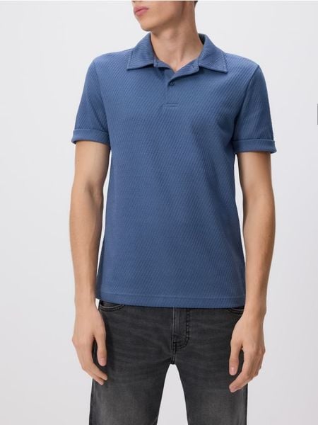 Koszulka polo regular fit - niebieski. Niebieskie koszulki polo męskie Reserved, l, bez wzorów, z bawełny, bez ramiączek. W wyprzedaży za 29.99 zł.