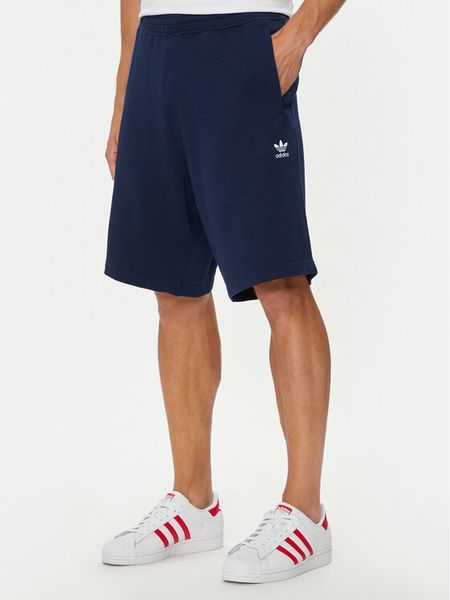 Adidas Szorty sportowe Essentials Trefoil IY8521 Granatowy Regular Fit. Niebieskie krótkie spodenki sportowe męskie Adidas, m, bez wzorów, z bawełny. Za 119.99 zł.