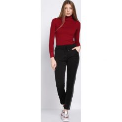 Czarne Spodnie Dresowe Patience. Czarne spodnie dresowe damskie Born2be, z dresówki. Za 39.99 zł.