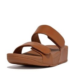 Skórzane sandały dla kobiet FitFlop Lulu Adjustable. Czarne sandały damskie Flip Flop, bez wzorów, ze skóry, bez obcasa, bez zapięcia. Za 485.50 zł.