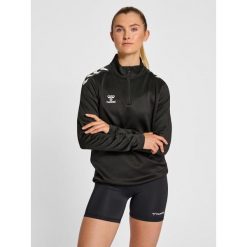 Damska bluza rozpinana 1/4 Hummel Core XK. Czarne bluzy sportowe damskie Hummel, bez wzorów, bez kaptura, na fitness i siłownię. Za 227.50 zł.