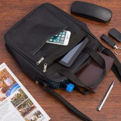 Męska torba na ramię raportówka A4 listonoszka czarna pojemna elegancka czarna F54. Czarne torby na ramię męskie bez wzorów, eleganckie, na ramię. Za 54.90 zł.