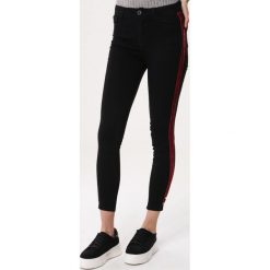 Czarne Jeansy Reasons. Jeansy damskie marki Born2be. Za 49.99 zł.
