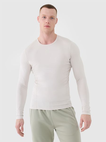 4F Longsleeve treningowy szybkoschnący męski - beżowy XL. Brązowe koszulki sportowe męskie 4f, m, bez wzorów, z dzianiny, bez kołnierzyka, bez ramiączek, na fitness i siłownię. W wyprzedaży za 59.99 zł.