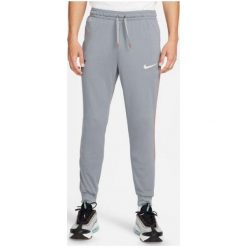 Nike Spodnie Nike Dri-Fit Libero DH9666 065 DH9666 065 szary XL. Szare spodnie sportowe męskie Nike, m, bez wzorów, dri-fit (nike). Za 143.09 zł.