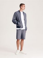 Szorty regular fit - granatowy. Niebieskie szorty męskie Reserved, l, bez wzorów, z bawełny. W wyprzedaży za 59.99 zł.
