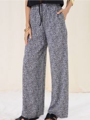 Wiskozowe spodnie wide leg w panterkę - wielobarwny. Spodnie materiałowe damskie Sinsay, l, bez wzorów, z wiskozy. Za 39.99 zł.