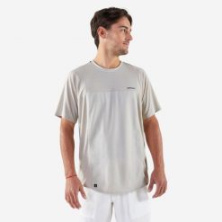 Koszulka tenisowa męska krótki rękaw Artengo Dry Gaël Monfils. Zielone koszulki sportowe męskie ARTENGO, l, bez wzorów, z elastanu, bez kołnierzyka, bez ramiączek, tenisowe. Za 69.99 zł.