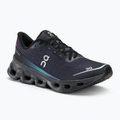 Buty do biegania damskie On Cloudspark black/blueberry. Niebieskie obuwie sportowe damskie On, bez wzorów, z nylonu, do biegania. Za 838.70 zł.