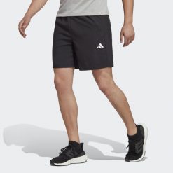 Spodenki krótkie treningowe męskie adidas Essentials. Czarne buty sportowe męskie Adidas, m, bez wzorów, z materiału, do biegania. Za 139.00 zł.