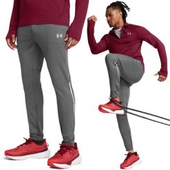 Spodnie treningowe męskie Under Armour wygodne dresowe do ćwiczeń. Szare spodnie sportowe męskie Under Armour, m, bez wzorów, z dresówki, trekkingowe. W wyprzedaży za 202.55 zł.