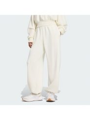 Adidas Spodnie dresowe Soft Lux JV9896 Kremowy Regular Fit. Białe spodnie dresowe damskie Adidas, xs, bez wzorów, z dresówki. Za 329.99 zł.