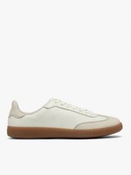 Kremowe półbuty w stylu sportowym na płaskim beżowym spodzie. Brązowe obuwie sportowe damskie Ryłko, bez wzorów, ze skóry. W wyprzedaży za 329.99 zł.