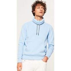Bluza z kominem - Niebieski. Bluzy męskie marki KALENJI. W wyprzedaży za 69.99 zł.