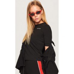 Dopasowany t-shirt - Czarny. T-shirty damskie marki DOMYOS. W wyprzedaży za 14.99 zł.