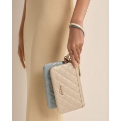 Torebka Nine West. Brązowe torebki do ręki damskie Nine West, bez wzorów, bez dodatków. Za 99.99 zł.