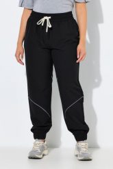 Damskie Funkcyjne spodnie treningowe hydrofobowe z elementami odblaskowymi. Czarne spodnie sportowe damskie Ulla Popken, plus size, bez wzorów, z materiału. Za 279.99 zł.