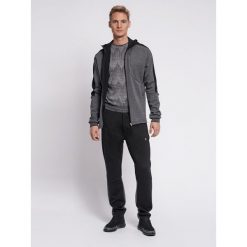 Hummel spodnie sortowe dresowe męskie Tropper Tapered Pants. Czarne krótkie spodenki sportowe męskie Hummel, m, bez wzorów, z dresówki, do piłki ręcznej. Za 130.00 zł.