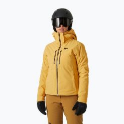 Kurtka narciarska damska Helly Hansen Alphelia Lifaloft sand. Żółte bluzy sportowe damskie Helly Hansen, bez wzorów, bez kaptura, narciarskie. Za 2,499.00 zł.