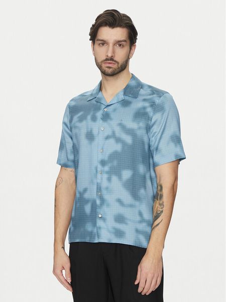 Calvin Klein Koszula K10K114190 Niebieski Regular Fit. Niebieskie koszule męskie Calvin Klein, m, bez wzorów, z lyocellu, bez kołnierzyka, bez ramiączek. Za 219.99 zł.