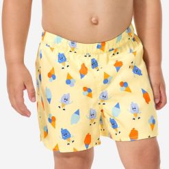 Szorty kąpielowe dla malucha Nabaiji Lody. Żółte szorty dla chłopców Decathlon, bez wzorów, z materiału, sportowe. Za 34.99 zł.