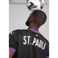 Męska koszulka FC St. Pauli 24/25 PUMA Black White. Białe koszulki sportowe męskie Puma, m, bez wzorów, bez kołnierzyka, bez ramiączek, do piłki nożnej. Za 400.50 zł.
