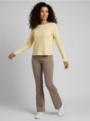 Bawełniana prążkowana bluzka z długim rękawem - żółty. Żółte bluzki damskie Sinsay, l, bez wzorów, z bawełny, bez kołnierzyka, bez ramiączek. Za 29.99 zł.