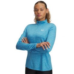 Under Armour koszulka sportowa damska Tech Twist. Niebieskie koszulki sportowe damskie Under Armour, l, bez wzorów, z poliesteru, bez kołnierzyka, bez ramiączek, do biegania. Za 334.99 zł.