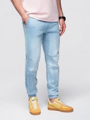 Spodnie męskie JOGGERY jeansowe z efektem sprania - jasnoniebieskie V1 - Rozmiar: S. Niebieskie spodnie materiałowe męskie Ombre Clothing, l, z aplikacjami, z bawełny, eleganckie. W wyprzedaży za 179.99 zł.