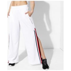 Tommy Sport Spodnie With Snaps 141 , biały, rozmiar XS. Białe spodnie dresowe damskie Tommy Hilfiger, s, bez wzorów, z materiału. W wyprzedaży za 299.99 zł.