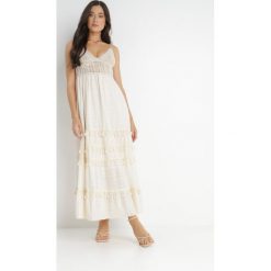Jasnobeżowa Sukienka Dorassa. Brązowe sukienki damskie Born2be, m, bez wzorów, z bawełny, boho, bez kołnierzyka, bez ramiączek, maxi, rozkloszowane. Za 199.99 zł.