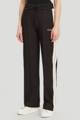 GUESS Czarne damskie dresowe spodnie Yarrow, Rozmiar M. Czarne spodnie dresowe damskie Guess, m, z aplikacjami, z dresówki. W wyprzedaży za 229.99 zł.