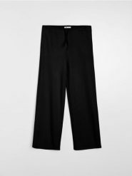 Spodnie dresowe wide leg - czarny. Czarne spodnie dresowe damskie Sinsay, l, bez wzorów, z dresówki, na fitness i siłownię. Za 39.99 zł.