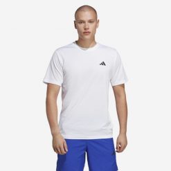 Koszulka fitness męska ADIDAS krótki rękaw. Koszulki sportowe męskie Adidas, m, bez wzorów, z materiału, bez kołnierzyka, bez ramiączek, na fitness i siłownię. Za 79.99 zł.