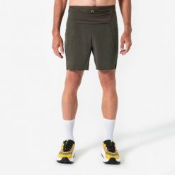 Spodenki do biegania w terenie męskie Kiprun Run 900 Ultra. Brązowe krótkie spodenki sportowe męskie KIPRUN, l, bez wzorów, z materiału, do biegania. Za 199.99 zł.
