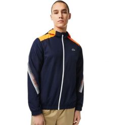 Kurtka sportowa męska Lacoste. Niebieskie kurtki sportowe męskie Lacoste, m, bez wzorów, tenisowe. Za 417.00 zł.