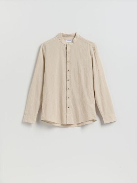 Strukturalna koszula regular fit - beżowy. Brązowe koszule męskie Reserved, l, bez wzorów, z bawełny, bez kołnierzyka, bez ramiączek. Za 119.99 zł.