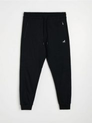 Spodnie dresowe regular jogger - czarny. Czarne spodnie sportowe męskie Sinsay, l, bez wzorów, z dresówki. Za 59.99 zł.