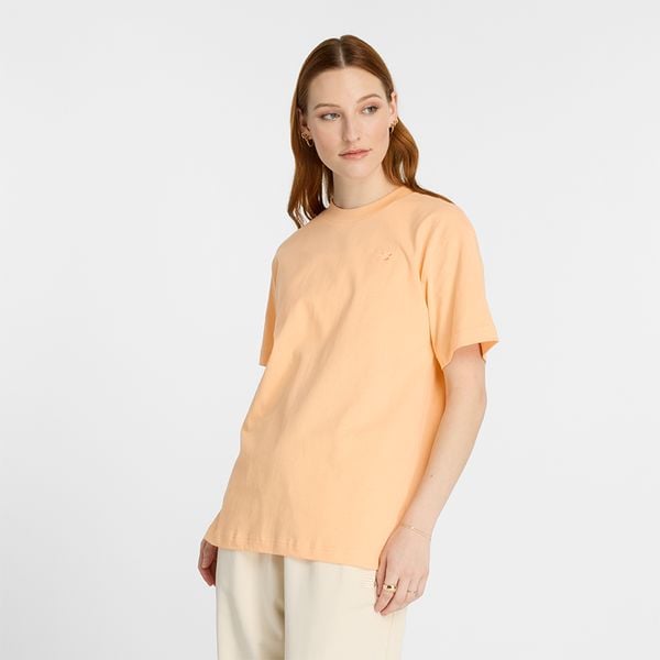 Koszulka damska New Balance WT41501PAE – pomarańczowa. Brązowe koszulki sportowe damskie New Balance, xs, bez wzorów, z materiału, eleganckie, bez kołnierzyka. Za 69.99 zł.