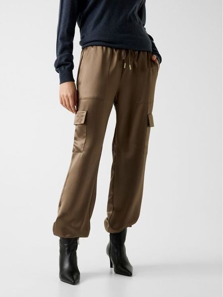 Guess Spodnie materiałowe W5GB08 WG7C0 Brązowy Slim Fit. Brązowe spodnie materiałowe damskie Guess, xs, z aplikacjami, z materiału. Za 614.99 zł.